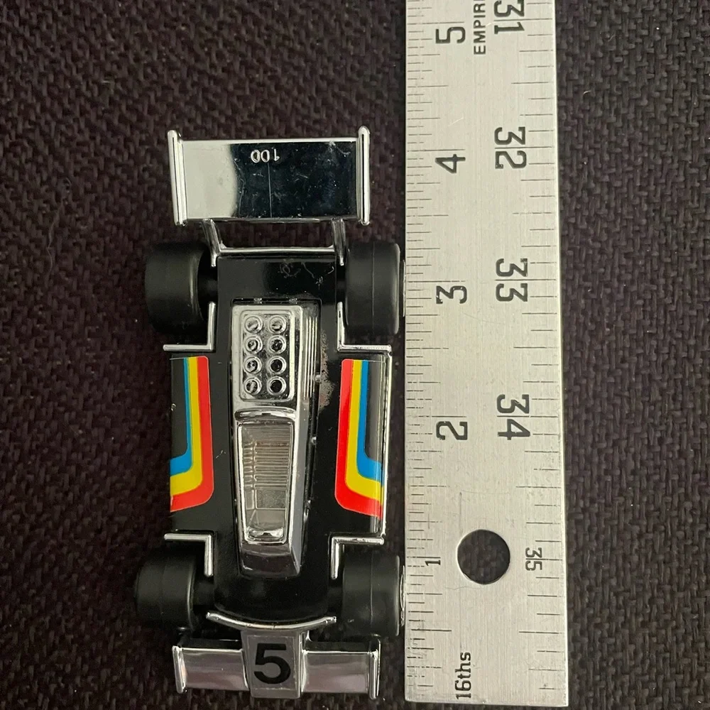 VTG 1979 Tonka black F1 race car w/ rainbow racing stripes